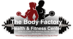 Logo for The Body Factory Health & Fitness Center with red and black silhouettes and a barbell, and the Belleview, FL address and slogan 'Rebuilding and Strengthening Bodies One Day at a Time'.